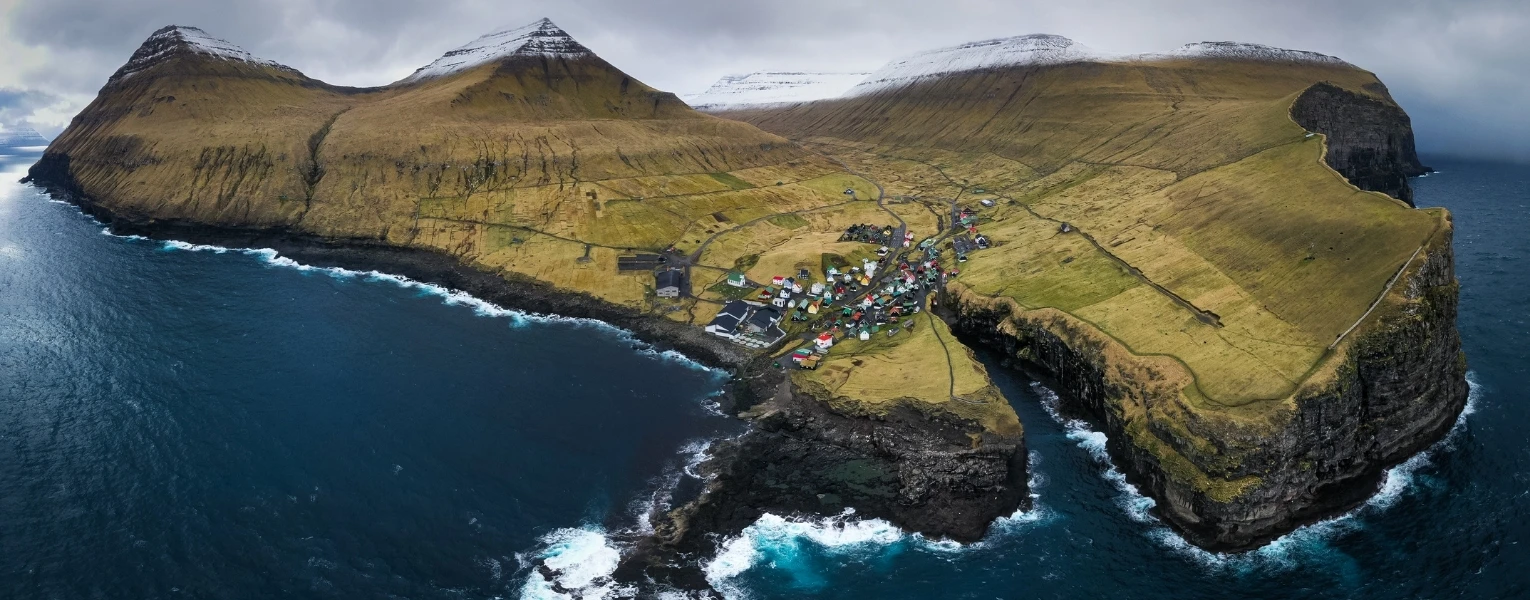 Faroe Islands Tour Packages Mulafossur waterfall and puffins